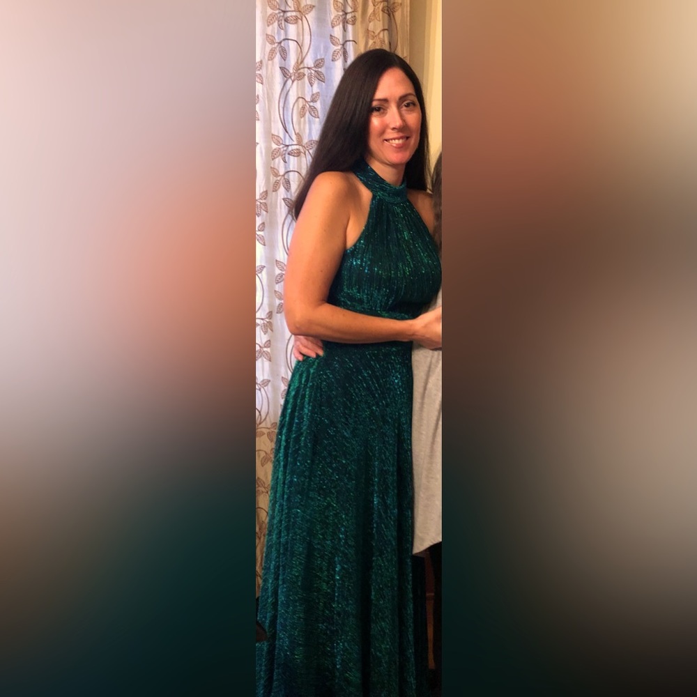 Perfect for prom wedding season. Sparkly blue-green Betsy & Adam formal dress.